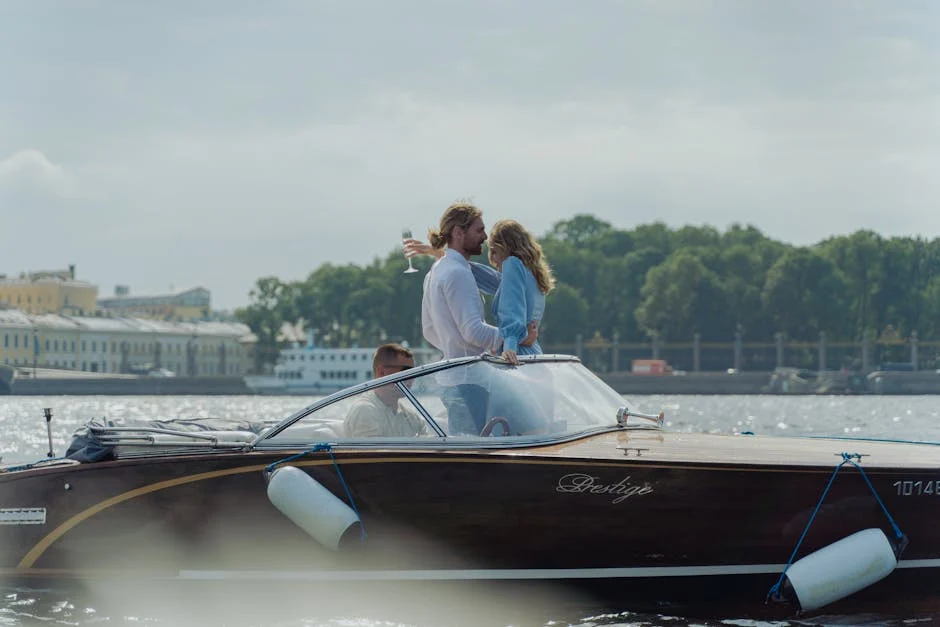 couple enjoying champagne on a luxurious yacht in the French Riviera - 30 year anniversary trip ideas